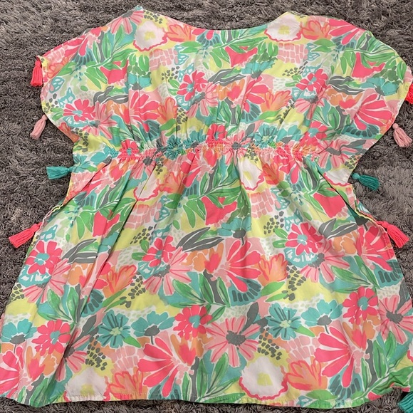 A dress from Cat and Jack that fits girls 7-8 years old. Good for any occasion. - Picture 3 of 4